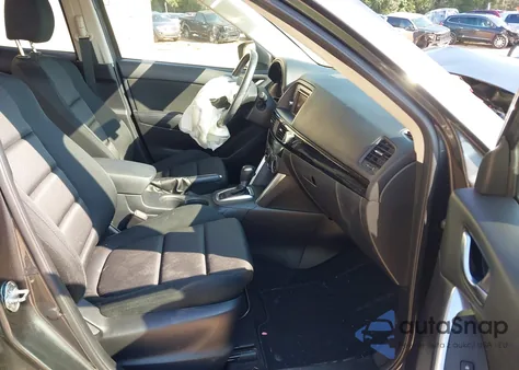 2015 Mazda Cx-5 Touring z USA, uszkodzony, nr VIN JM3KE2CY7F0549654